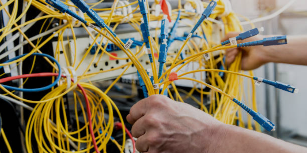 connecting-network-cable Image of Fiber Optic Cables properly labeled before installation.